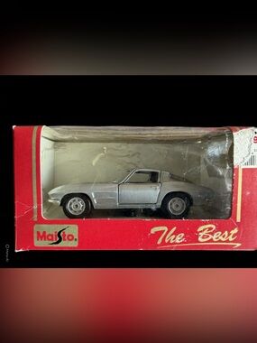 Maisto Silver Die-Cast Car in Original Red Box